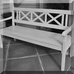 L06. White outdoor bench.